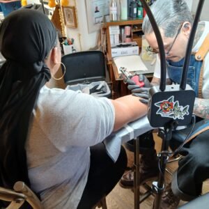 Kaliyah getting tattoo